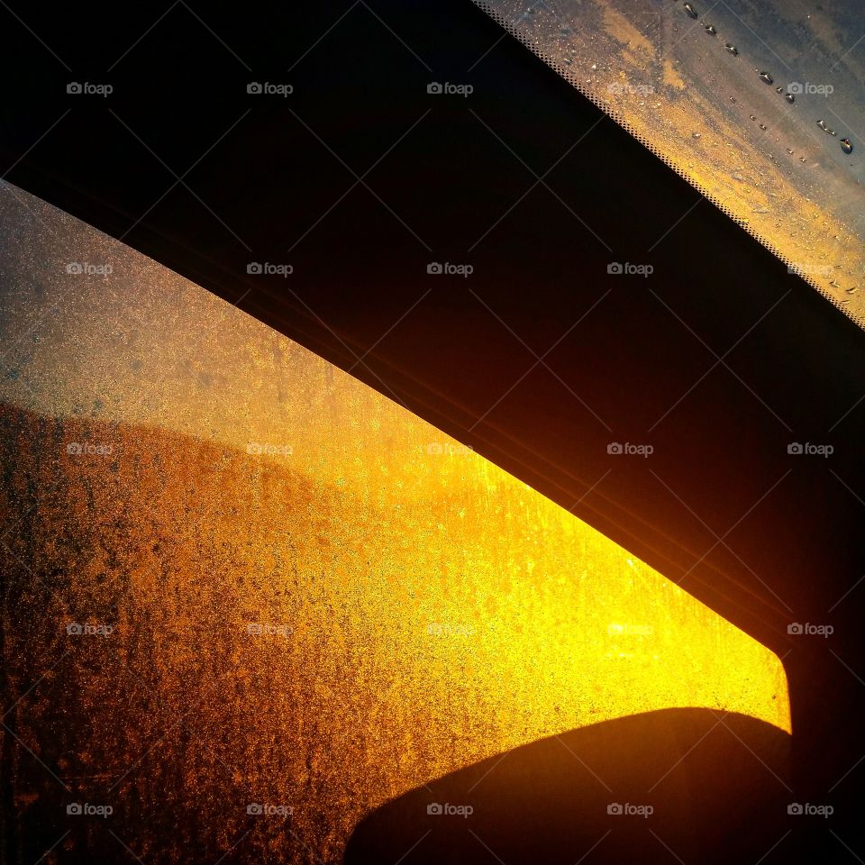 sunrise in a frosted car