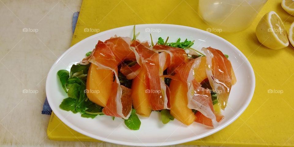 melon wrapped in prosciutto