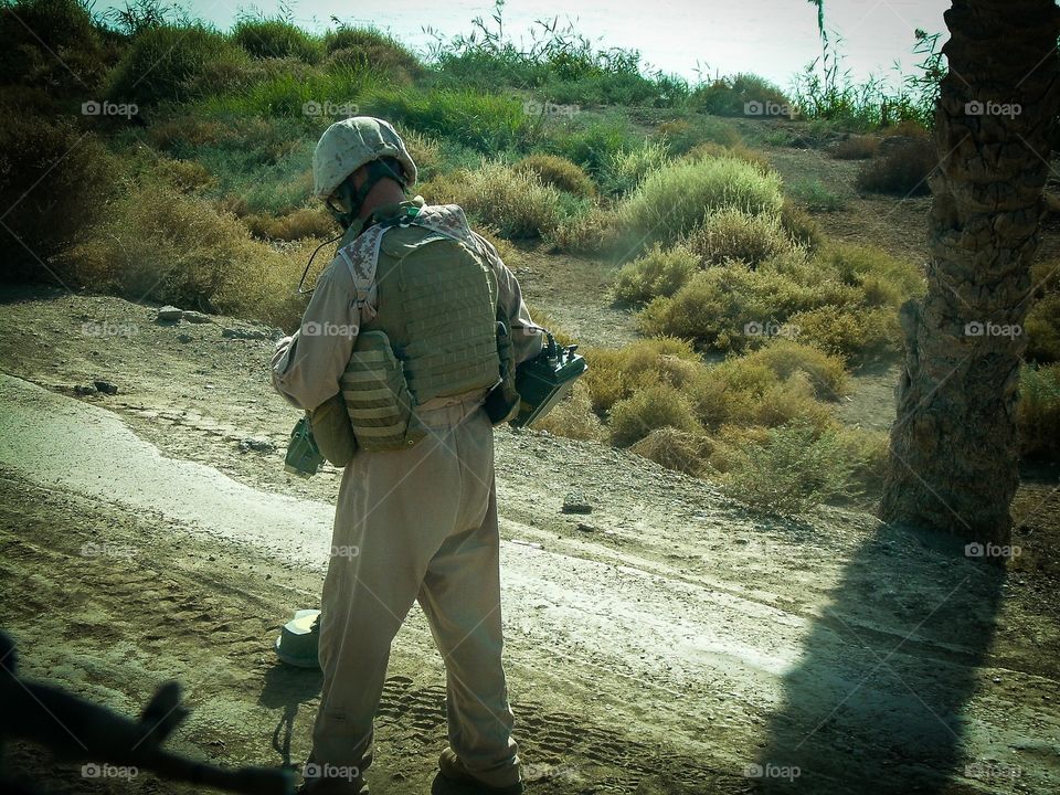 Marine Engineer Sweeping for Bombs