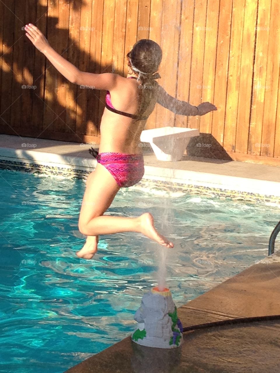 Running through the sprinkler