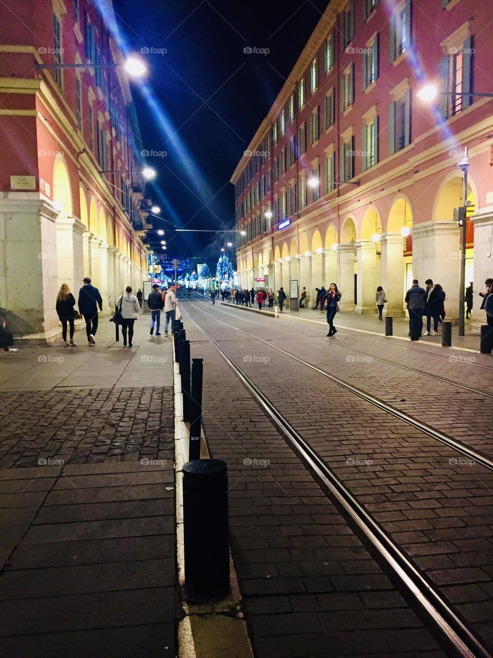 Enlightened street in the center of Nice, France, lights in the city, city at night 