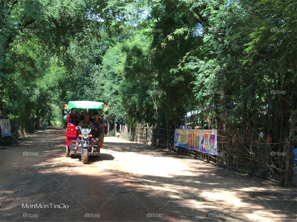 Motorcycle with carriage is one and only vehicle for transportation in remote area 