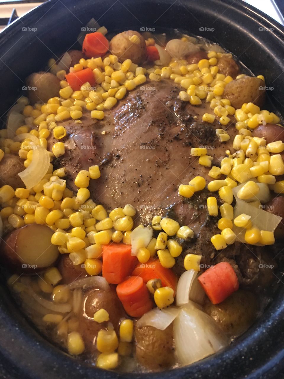 Deer roast with corn,carrots,onions and potatoes. Can you smell it? Sure smells yummy!