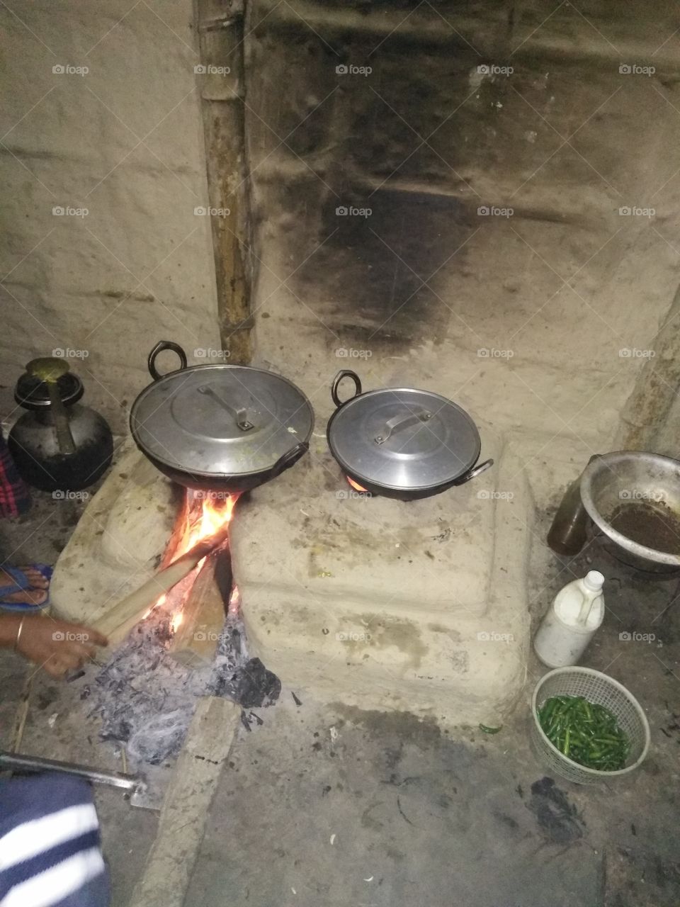 Traditional cooking at country,  Cooking with firewood,  Mud made kitchen Stove