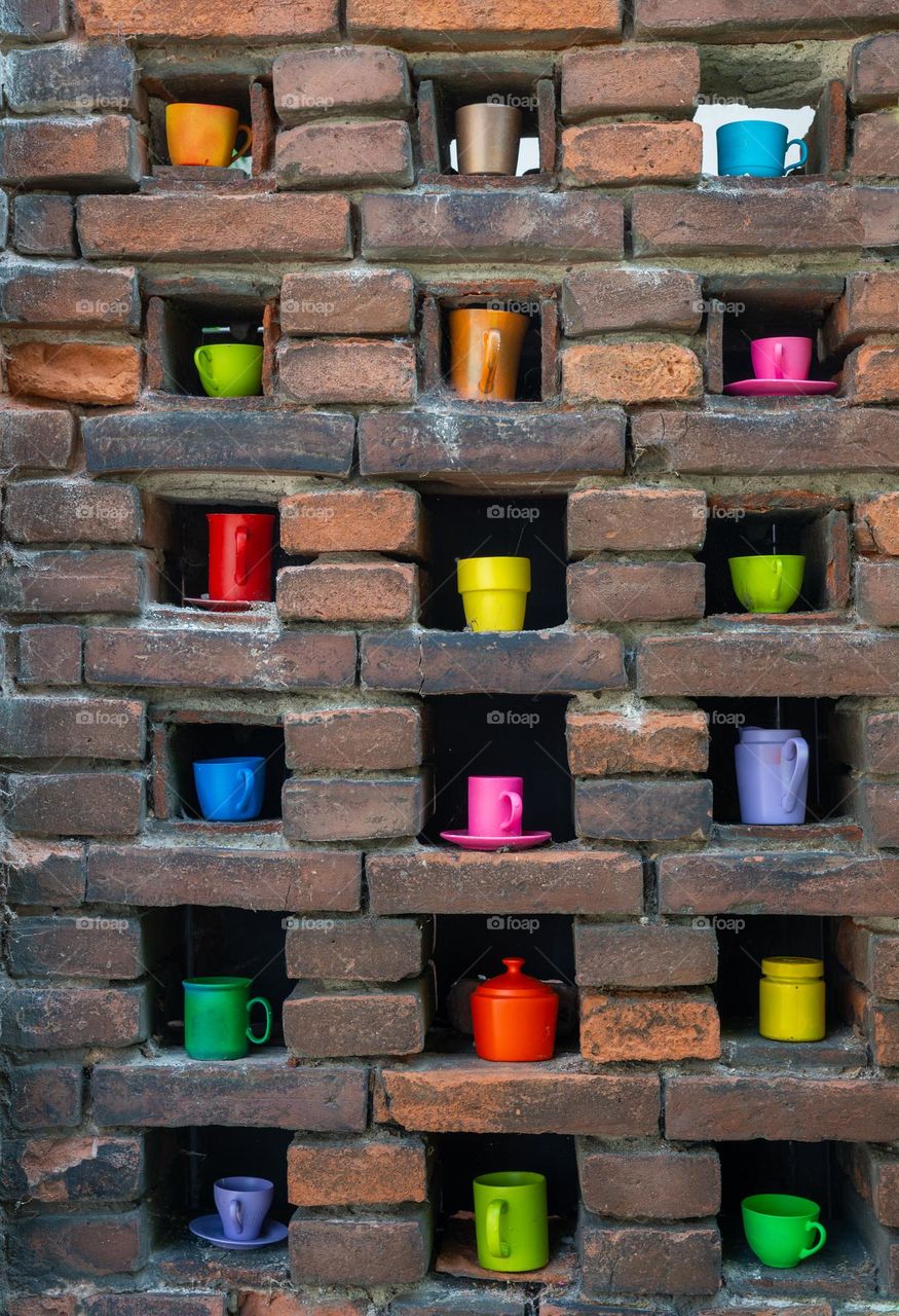 wall with colorful dishes