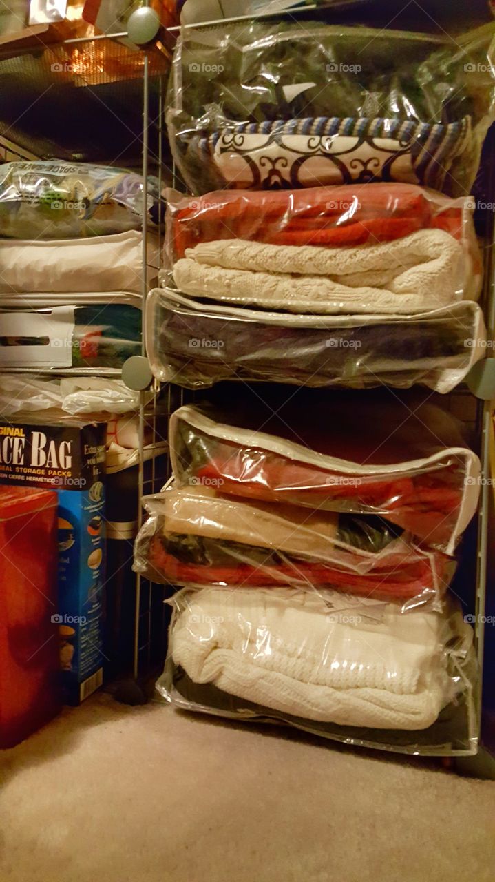 putting away the sweaters