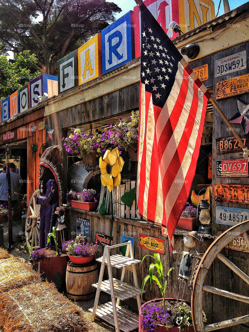 American flag and Americana knickknacks at an old west storefront