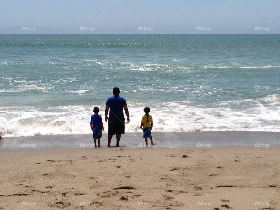 Papi with the kids at the beach