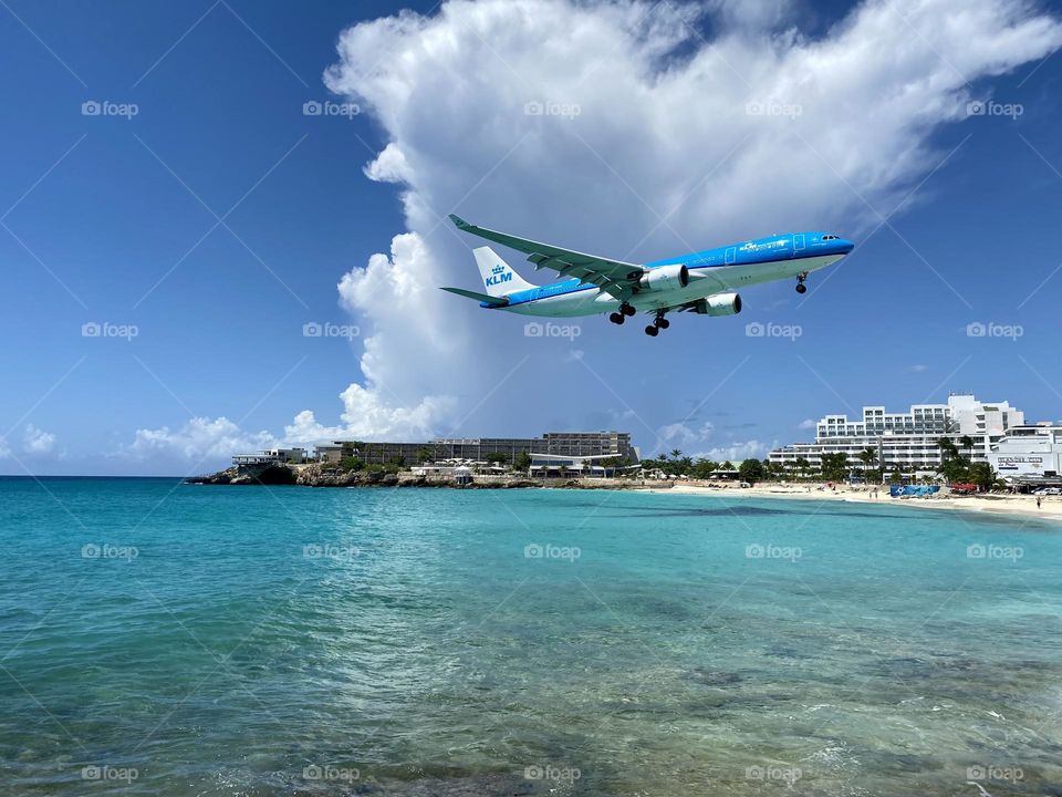 Airplane coming in for landing Saint Maarten island 3