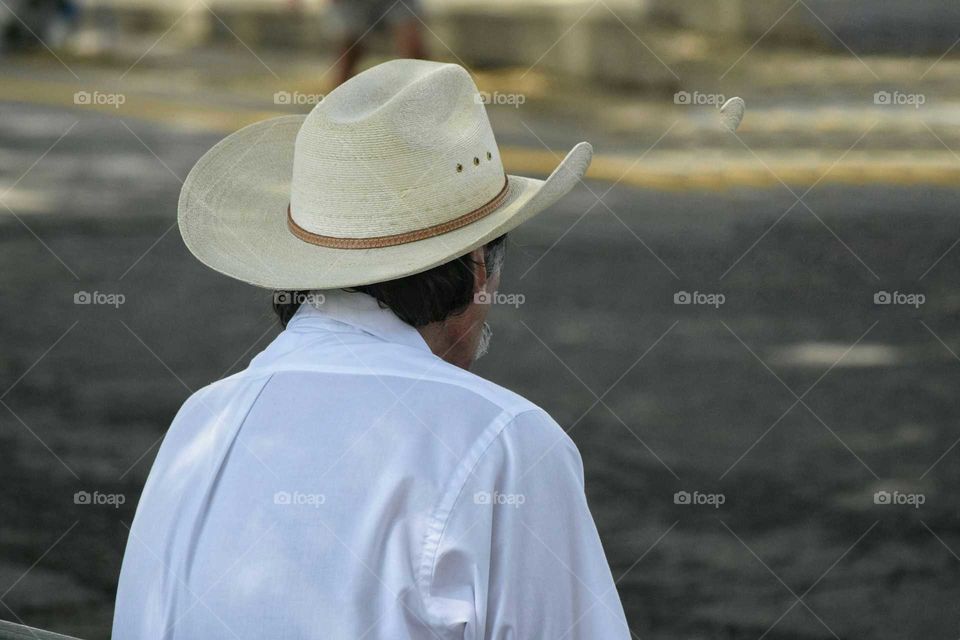 Cowboy taking a break at county fair