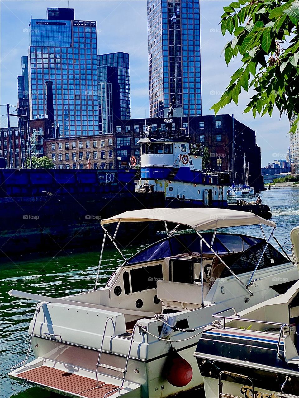 The wheelhouse of this enormously large barge is approaching us now on the “East River” at “Newtown Creek” by the “Pulaski Bridge” in LIC, Queens on a warm sunny Indian summer afternoon in September 2023. Hypnotic Productions