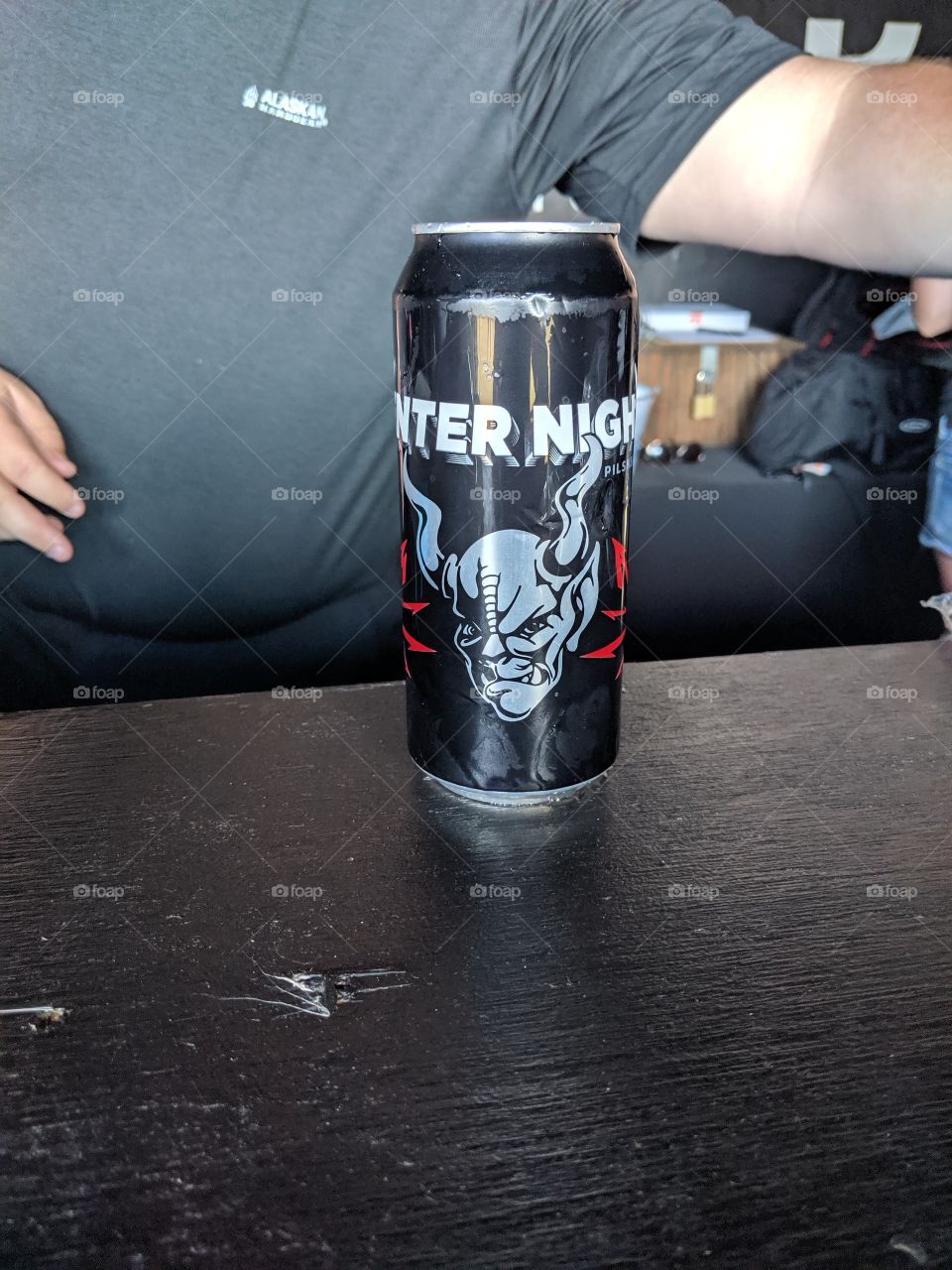 Beer can at a bar