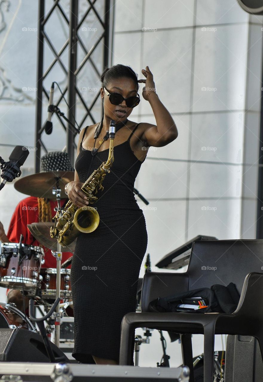 jazz band lady on saxophone