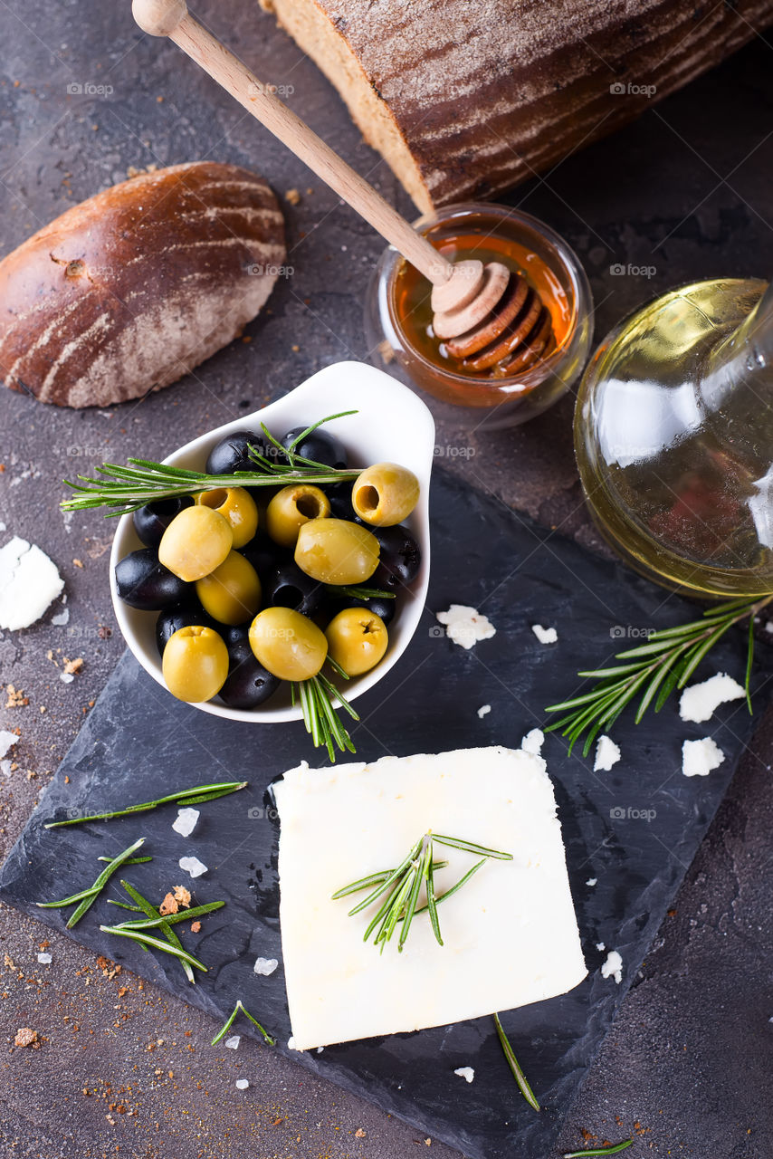 High angle view of breads and olives