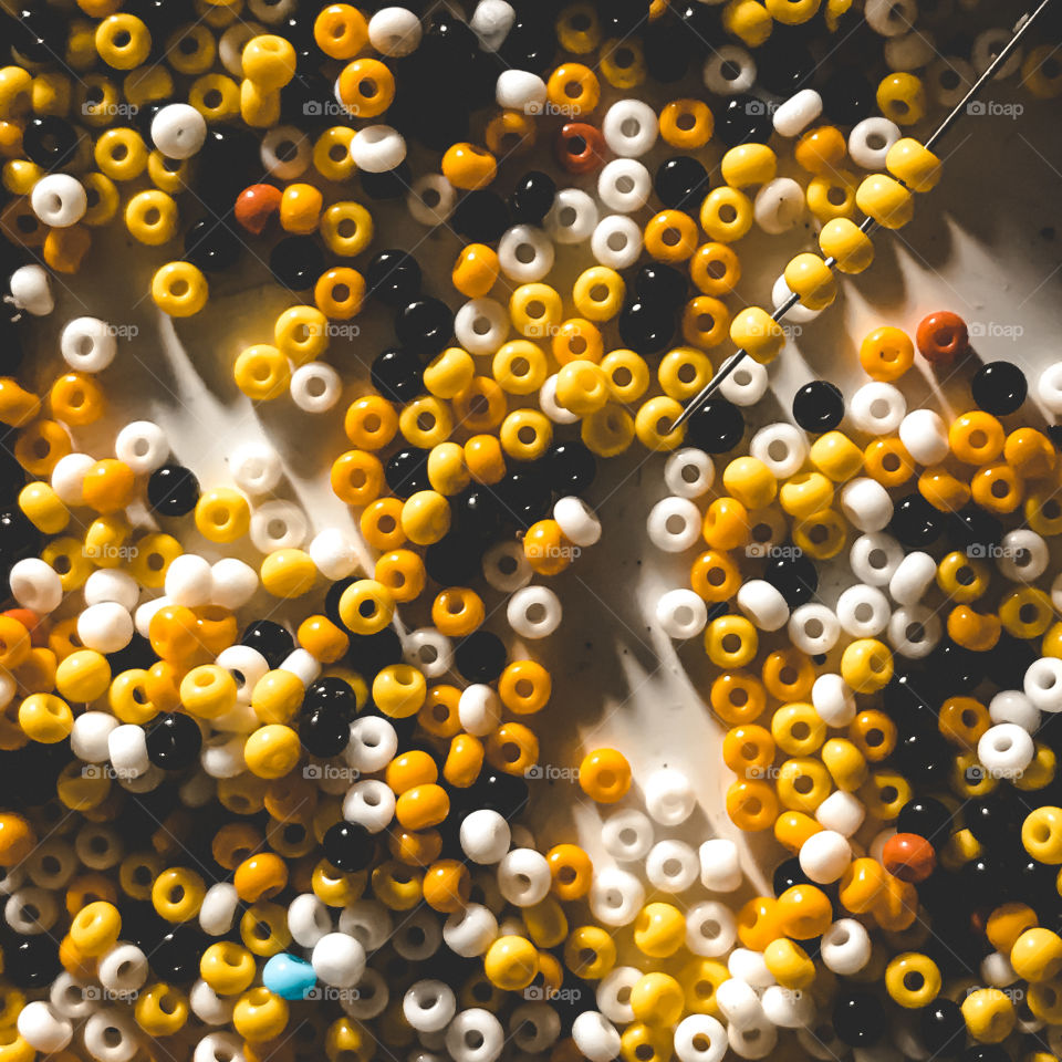 Ceramic beads or beads.  Used a lot by indigenous people to make necklaces and bracelets.