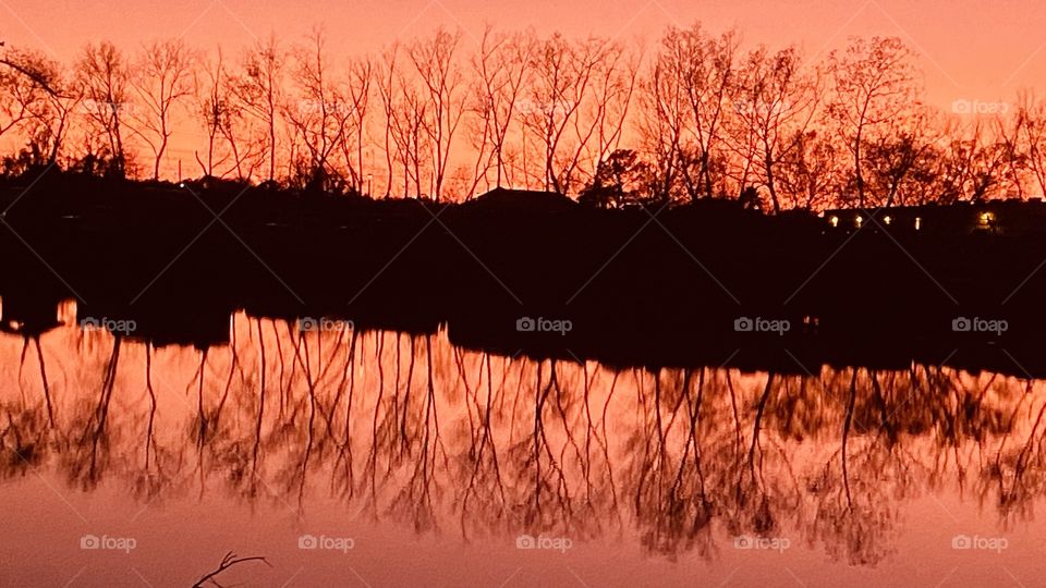 After Sunset, Twilight headed for Night Total Reflection from Backlit Twilight on Lake Waters. Reflective features of clarity and True Peach Colored Hues.