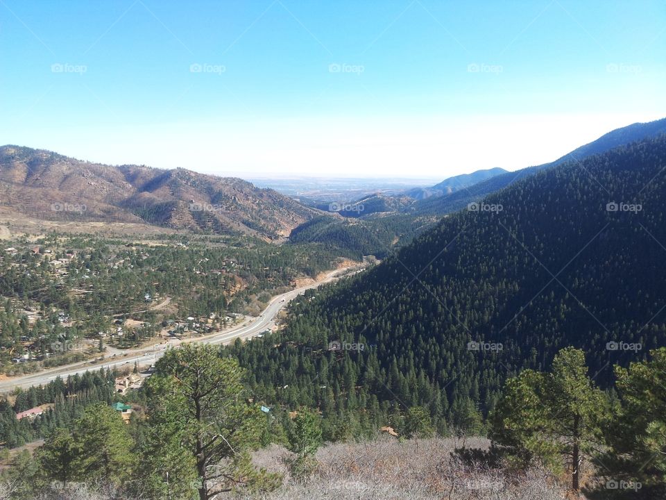 View driving up pikes peak in Colorado. 
