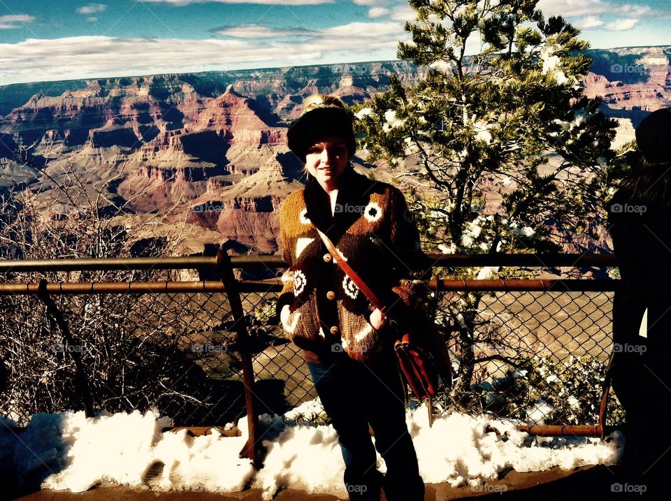 Woman in front of he Grand Canyon 