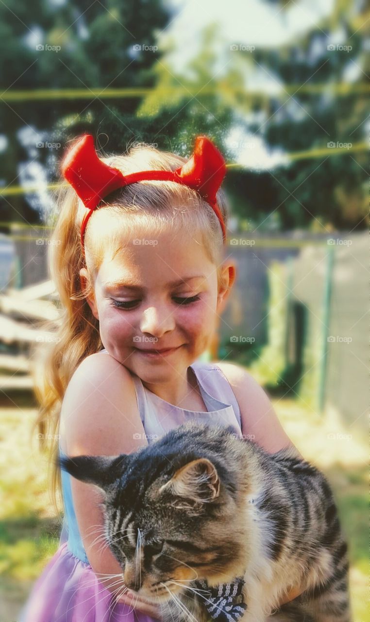 My beautiful little girl and my Maine Coon Cat Hannibal