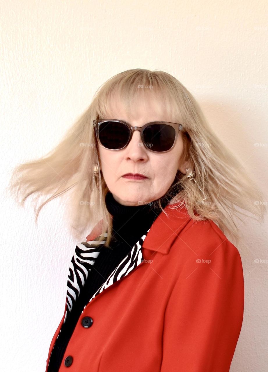 Older woman wearing sunglasses 