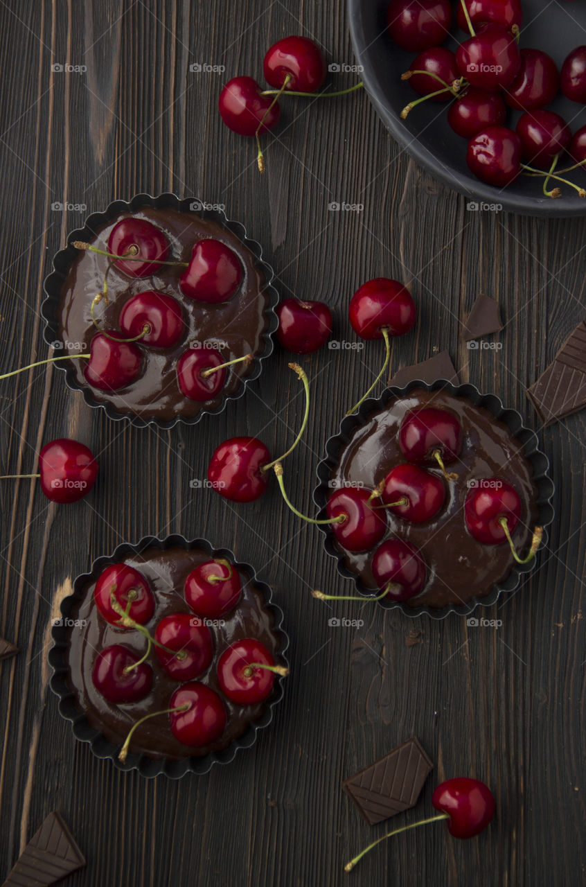 chocolate mini tarts with cherry