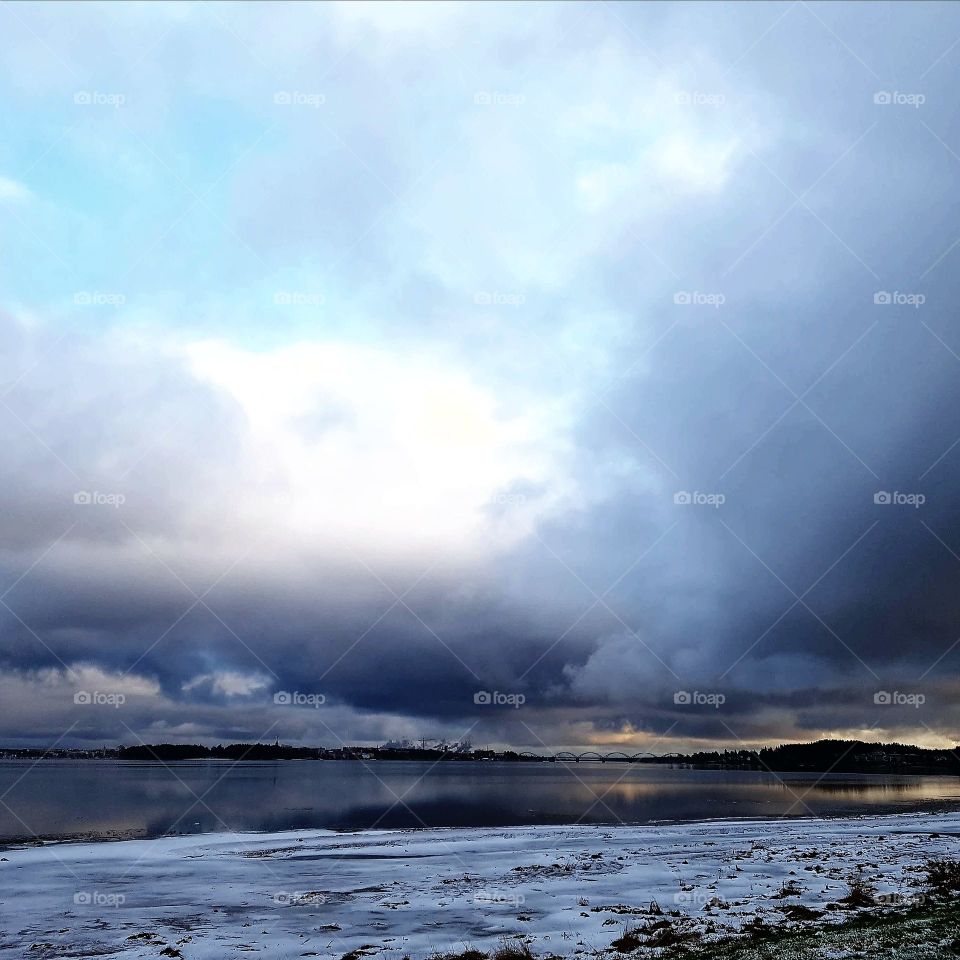 bug heavy clouds over the river