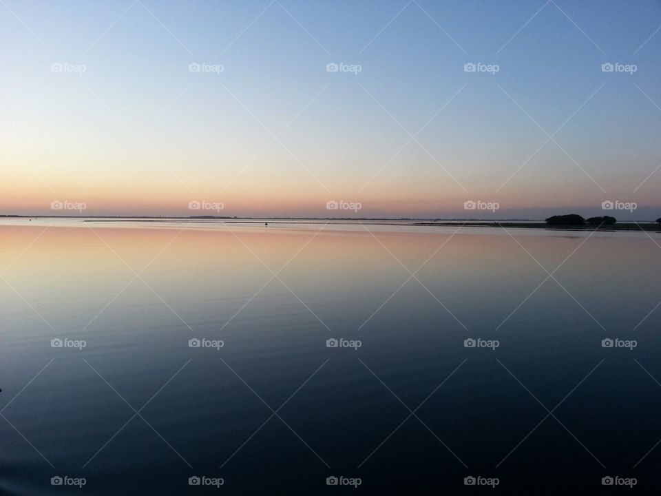 Idyllic lake against sky