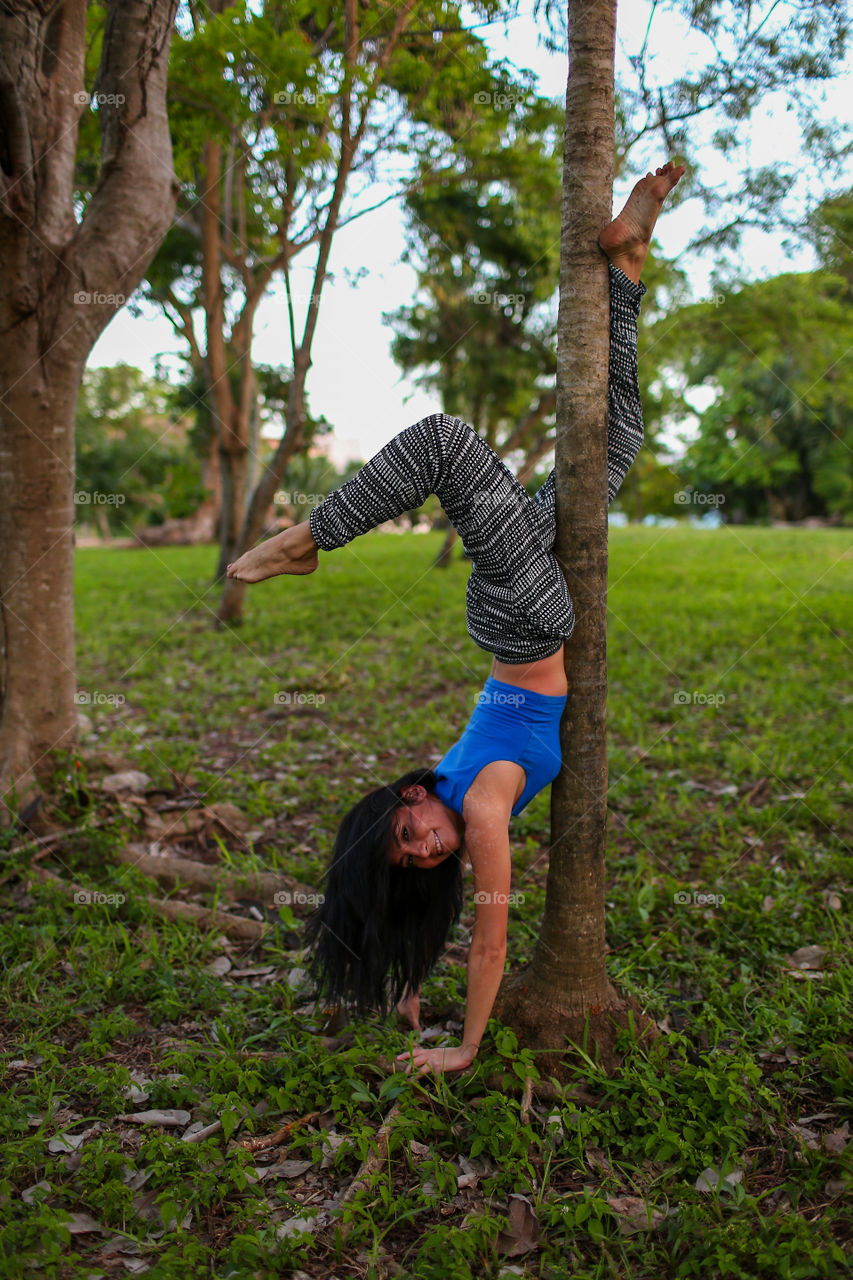 One girl stretching in the garden with the nature 