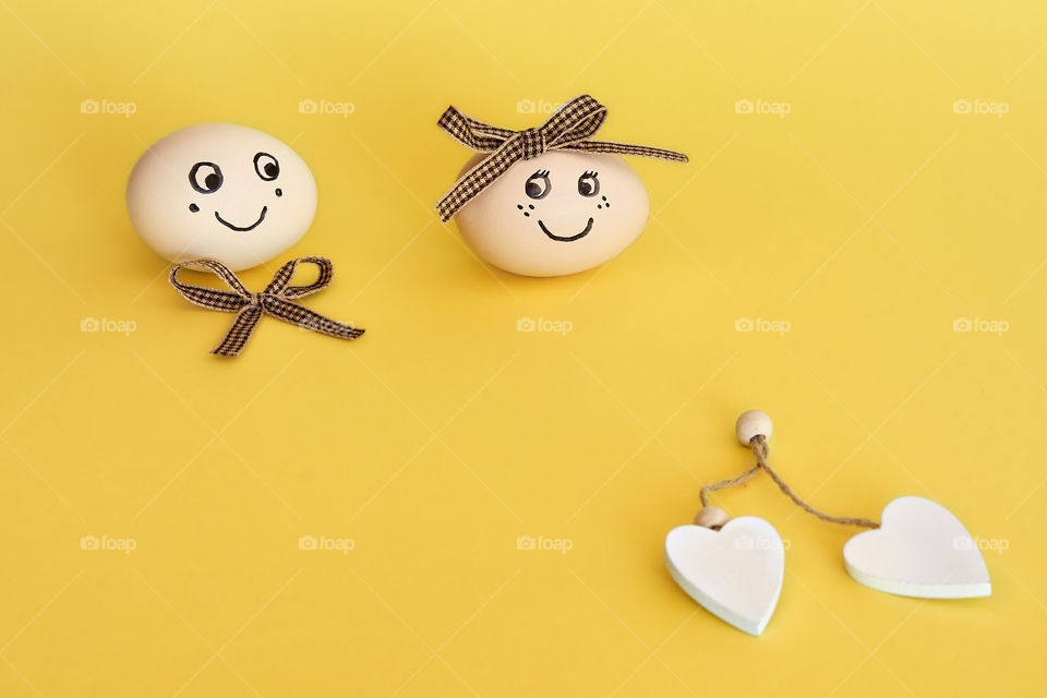 Easter eggs on yellow background