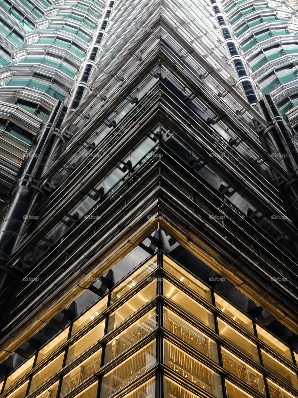 Details of steelwork at the Petronas Towers at night