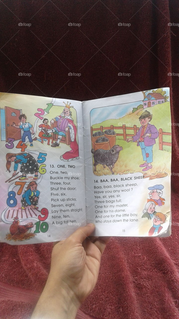 reading a nursery rhyme to baby