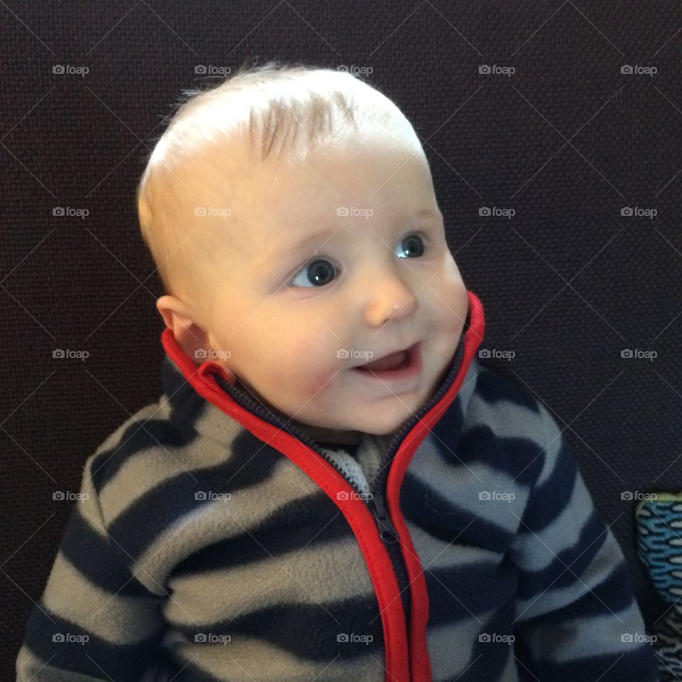 Close-up of a baby boy smiling