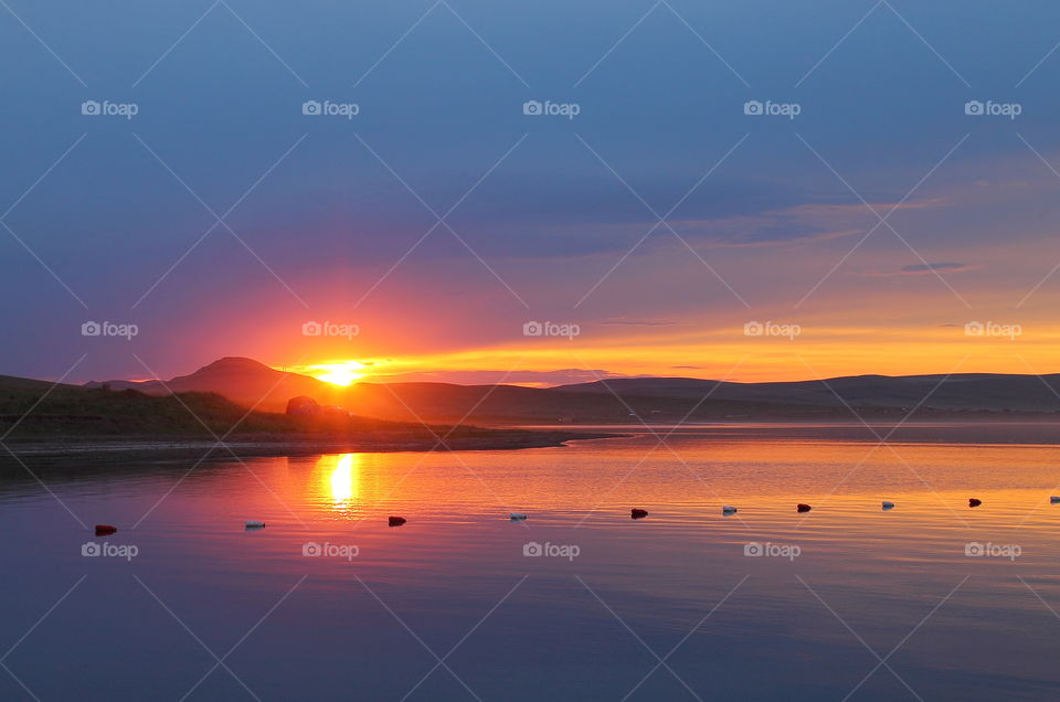 the lake during gold hour