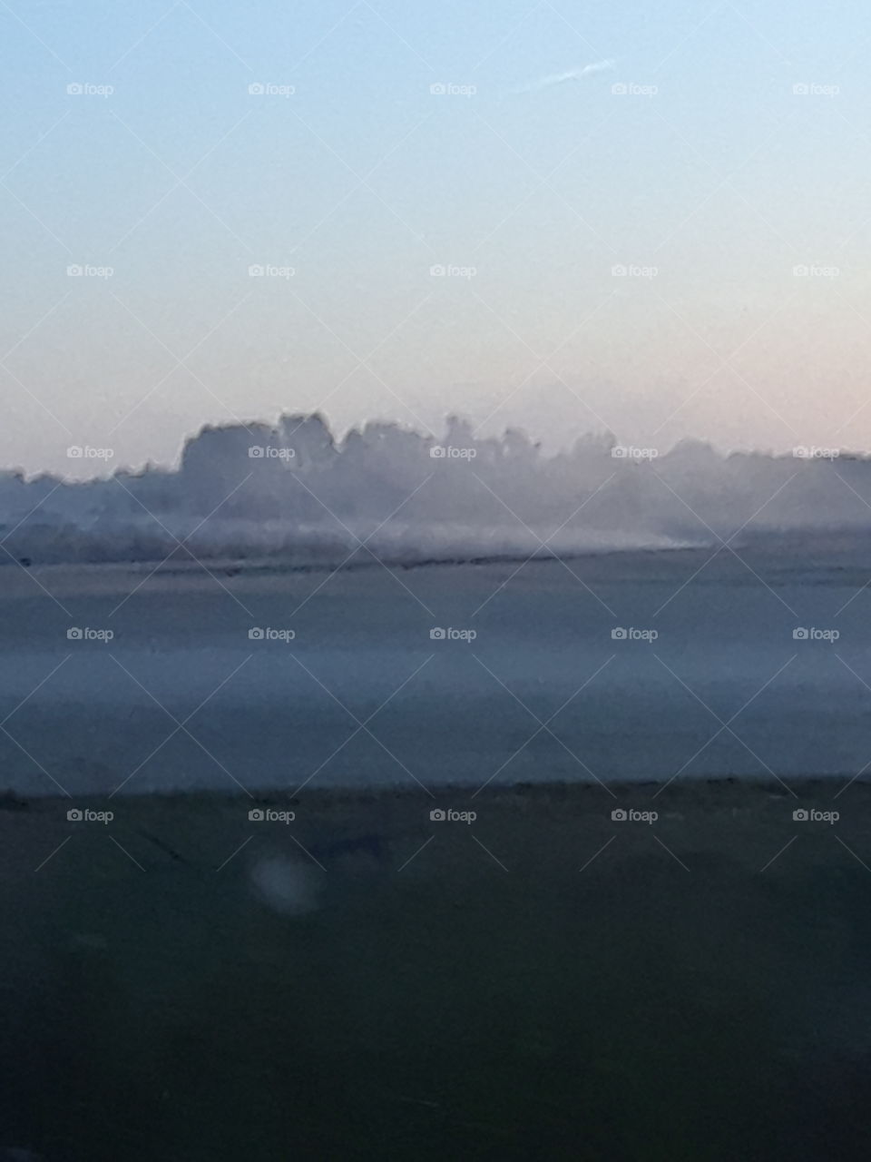 fog rolling across field