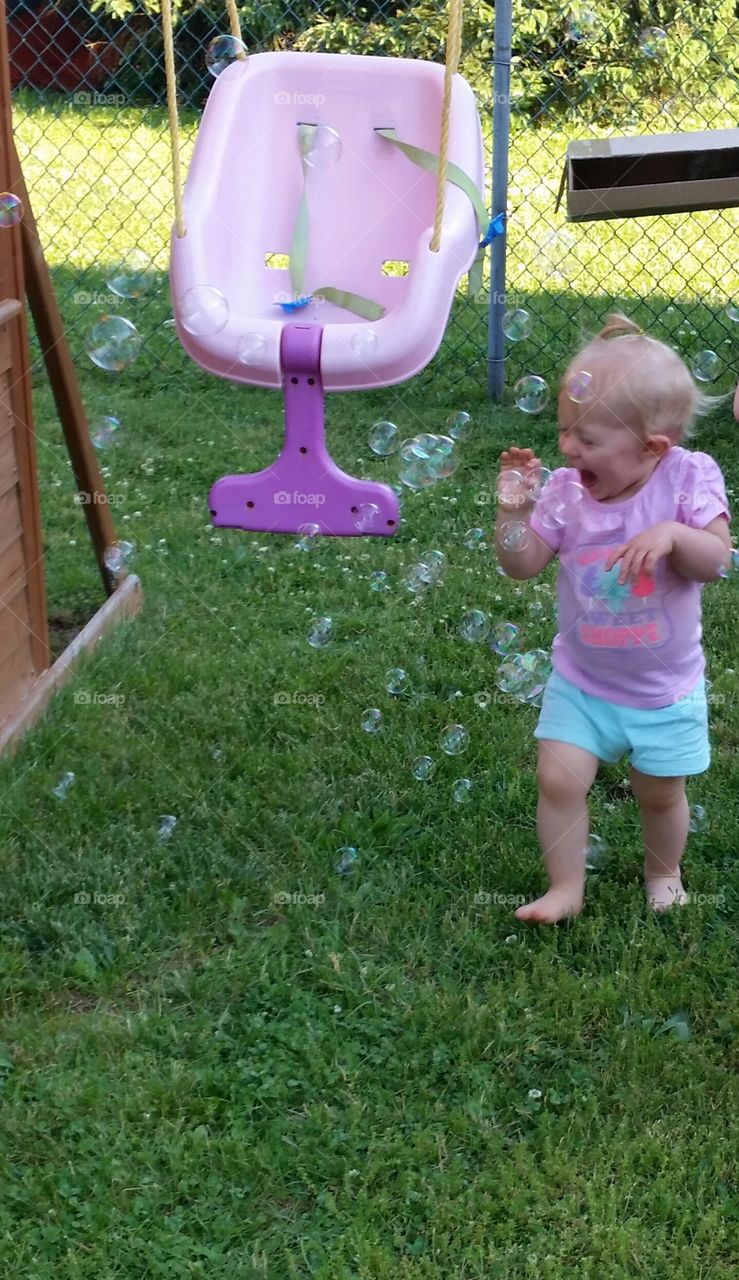 Bubble fun!. My little girl loves bubbles, so I bought a bubble machine and she had a blast running through the bubbles!