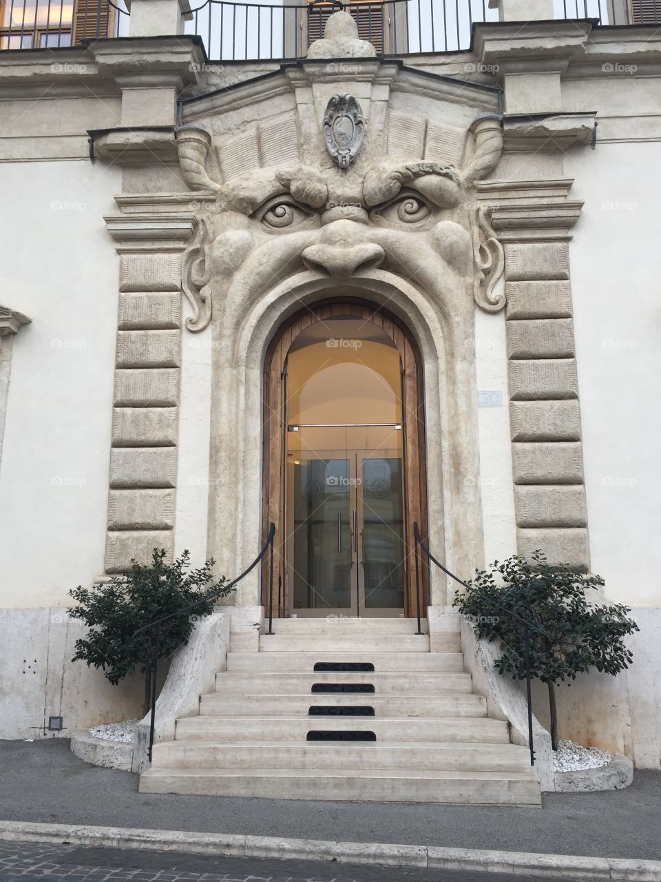 Unique building doorway in Rome, Italy. 
