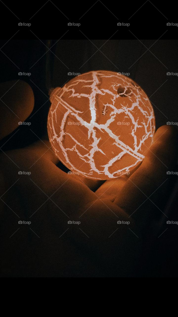 Orange lighting Ball LED in Hand 🕯️