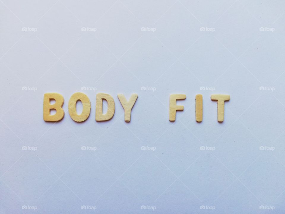 Written: "body fit" on a white background