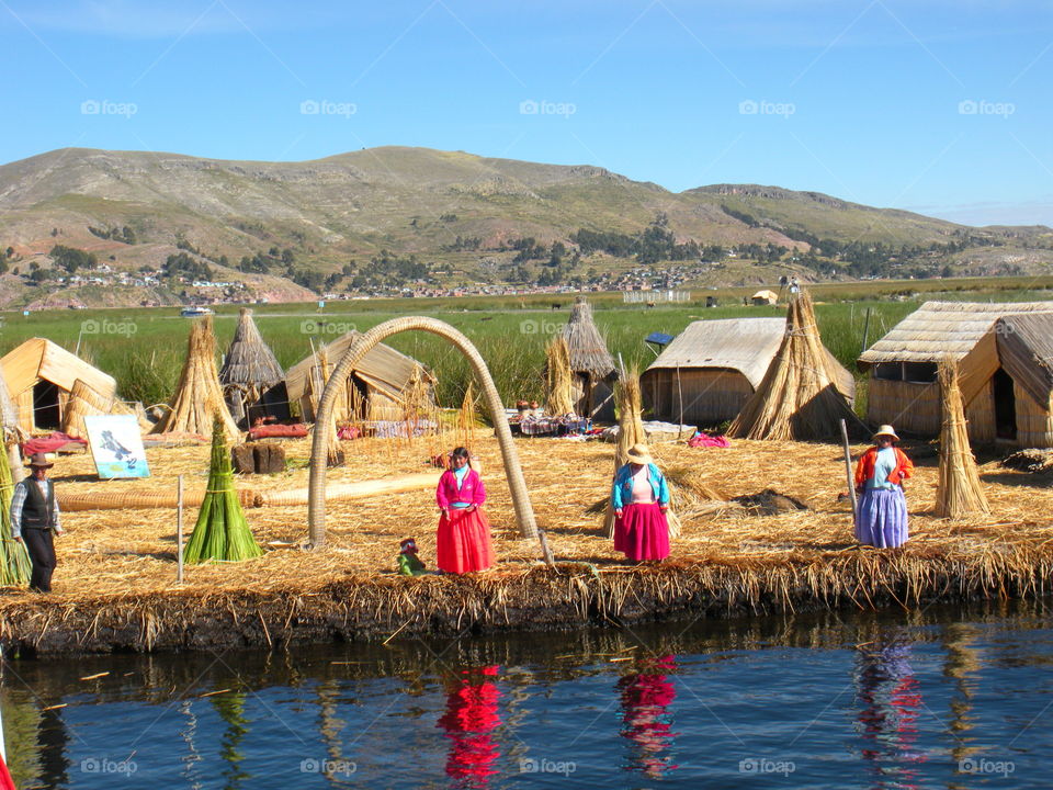 Uru people on the Floating Islands on Lake Titicaca in Peru