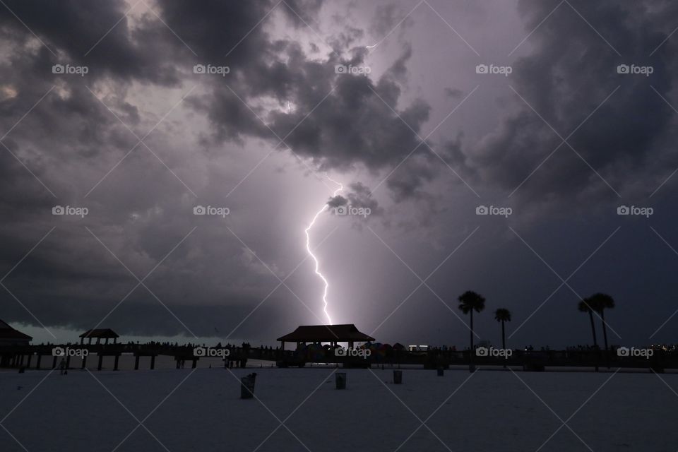 Thunderstorm with lightning on Clearwater Beach Florida, stormy weather 