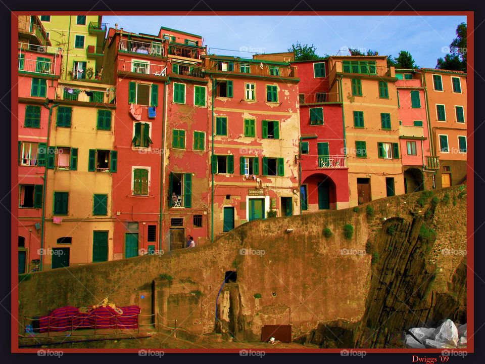 Riomaggiore  evening sunlight. A Cinque Terre village in Italy where each home brims with color
