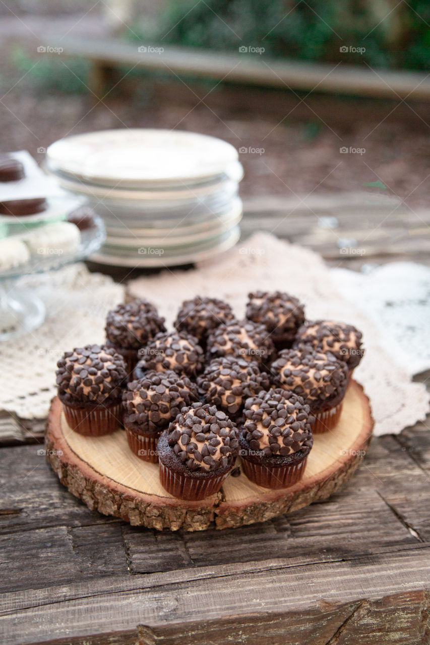 Chocolate chip cupcakes on picnic table