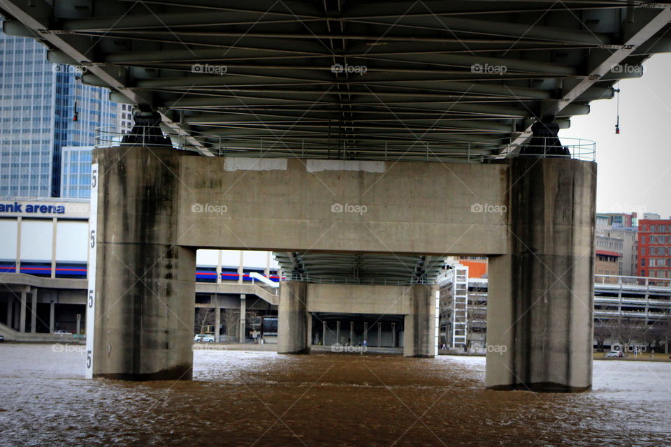 This is the view under the bridge going over the Ohio River in Newport Kentucky by the Aquarium.