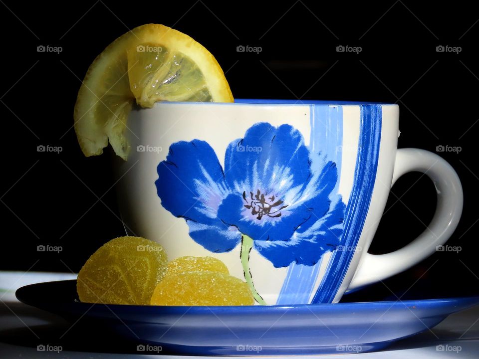 A cup of tea with lemon