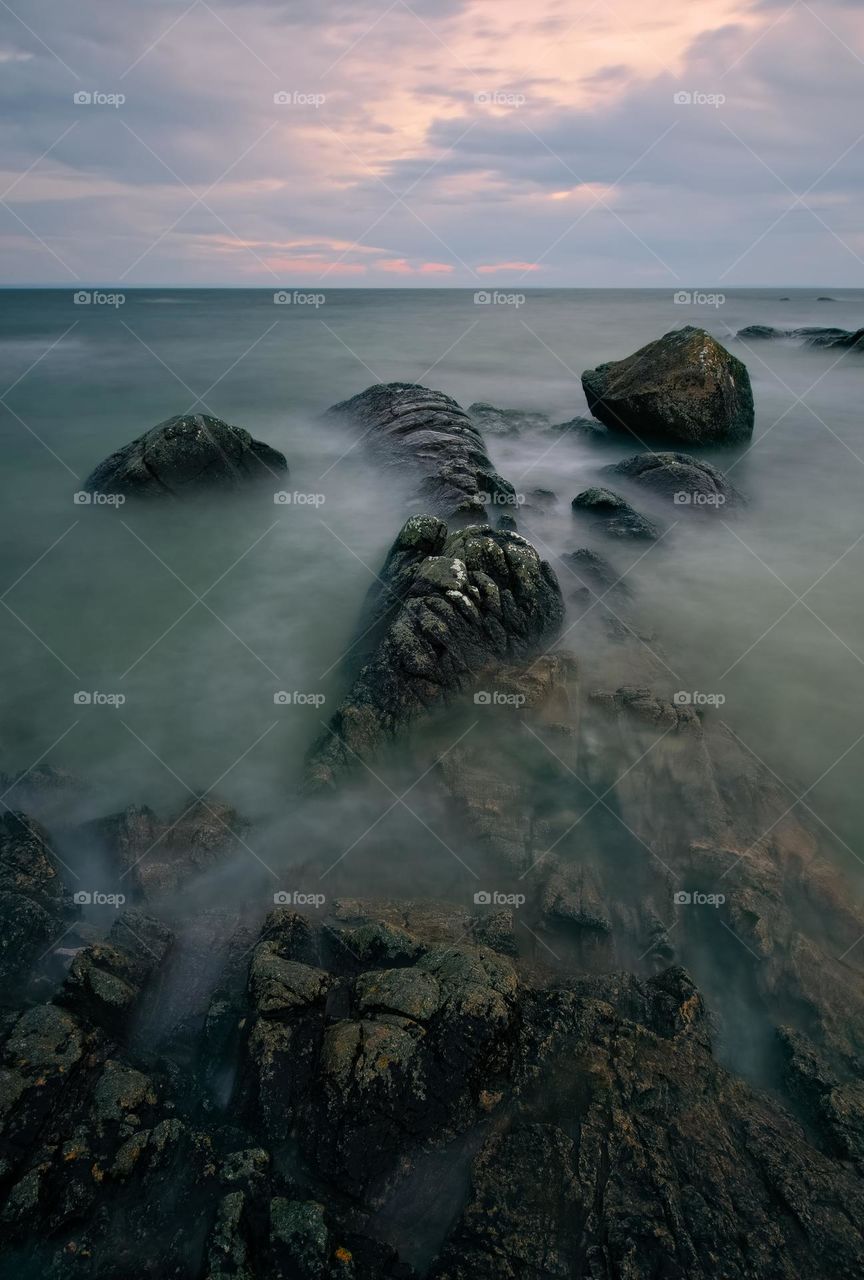 Sunset seascape scenery of rocky coast at wild atlantic way in county Galway, Ireland