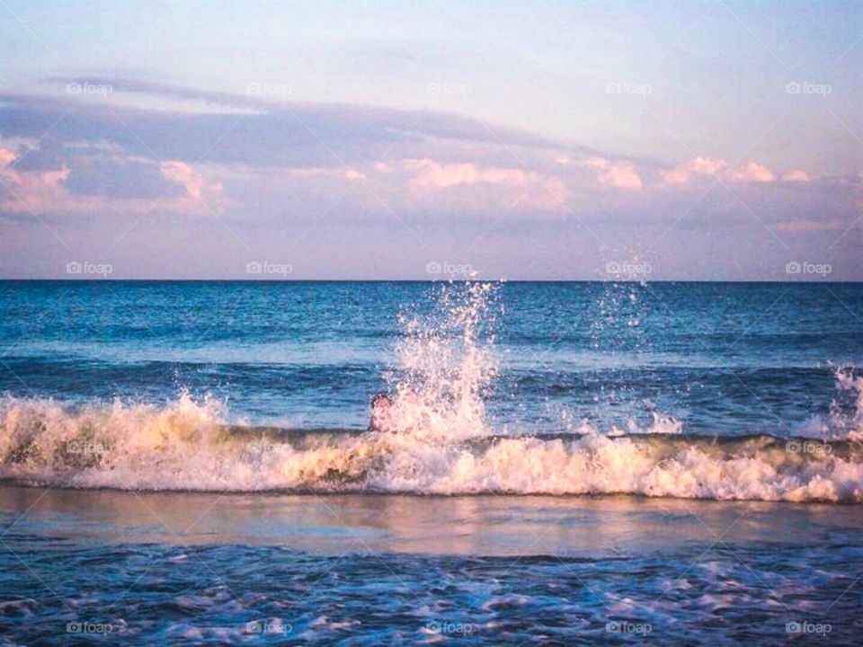 Big waves. Playing in the wave