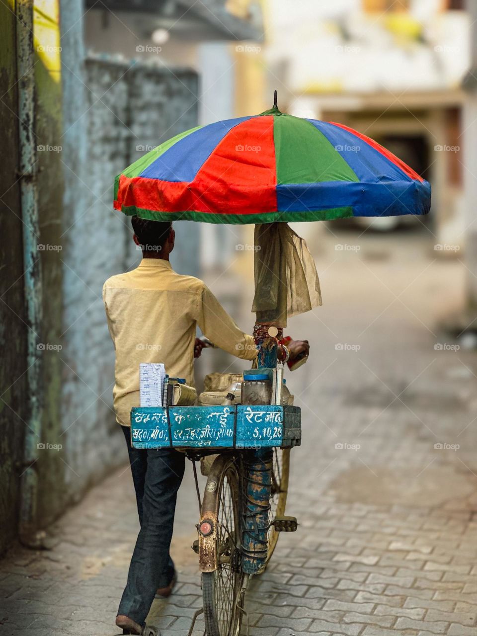 Colorful umbrella on cycle 