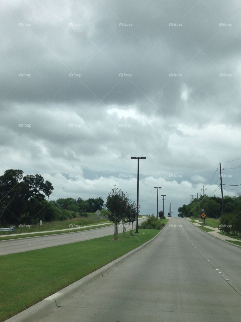 Country storms . Storm clouds on a country road