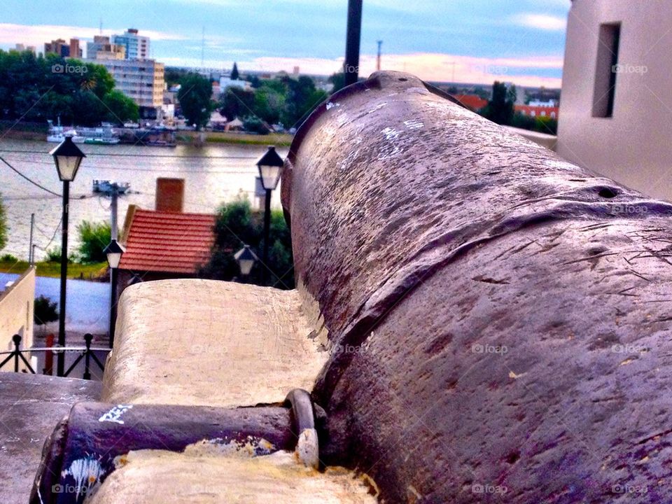 Cannon pointing to the river