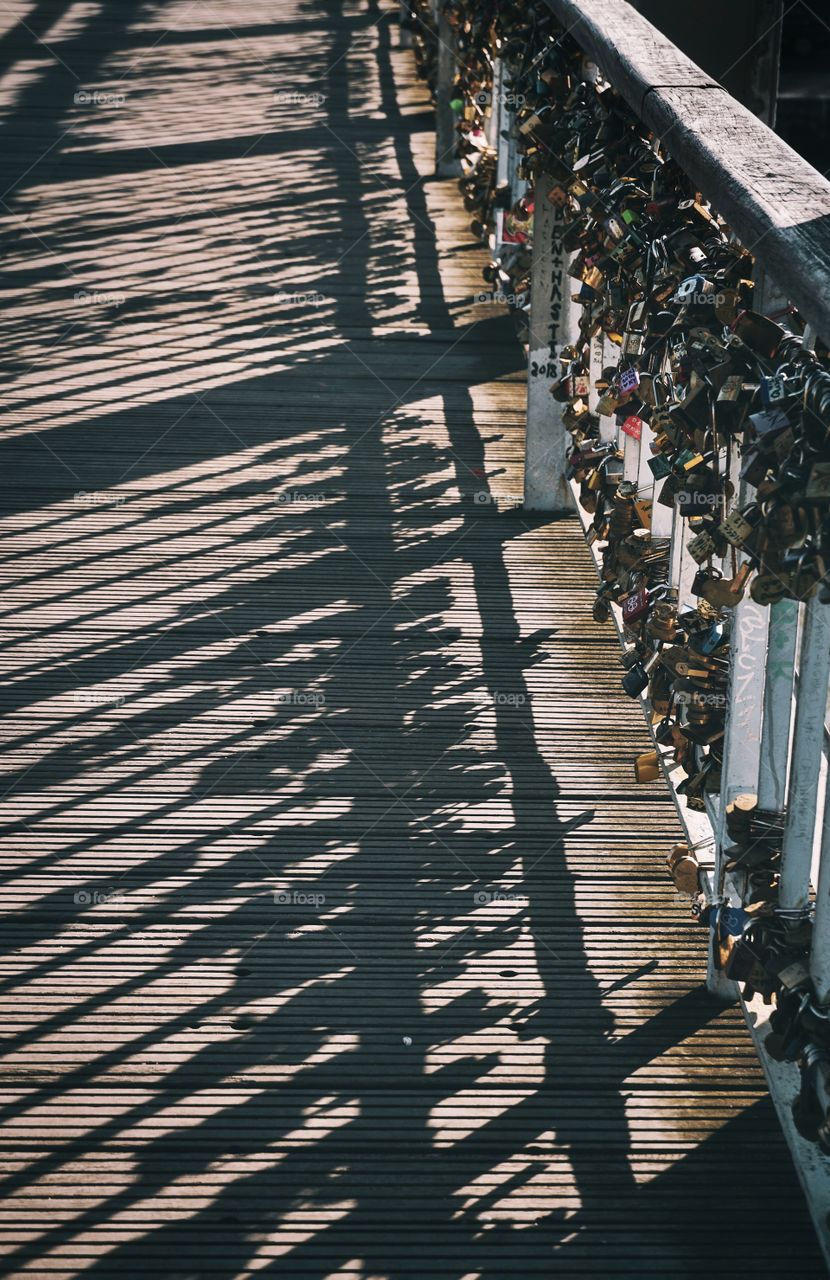 Shadow of love locks in Paris